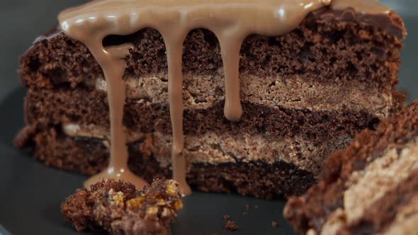 Chocolate Cream is Poured on Baked Chocolate Cake with Nut and Lemon Filling