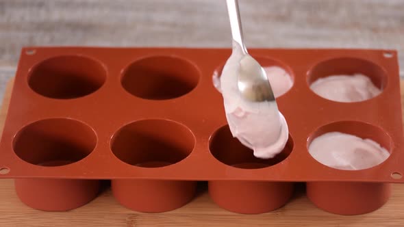 The Process of Making Homemade Ice Cream with Berries