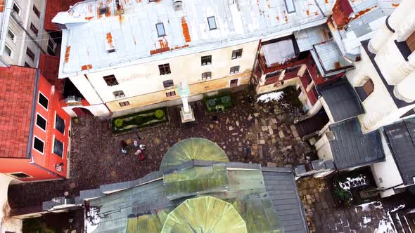 Aerial view of a drone flying over the building.