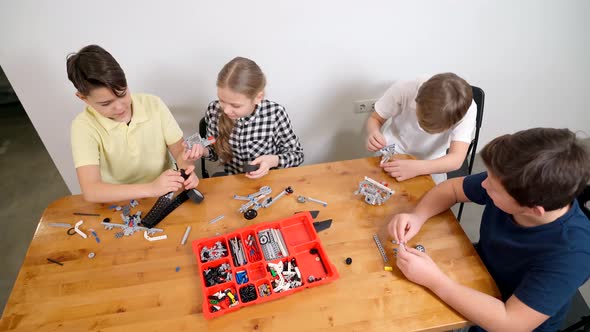 Creative Kids Using Building Kit.