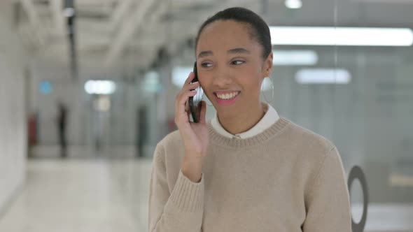 Creative African Woman Talking on Phone