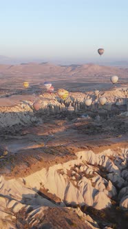 Vertical Video of Hot Air Balloons Flying in the Sky Over Cappadocia Turkey