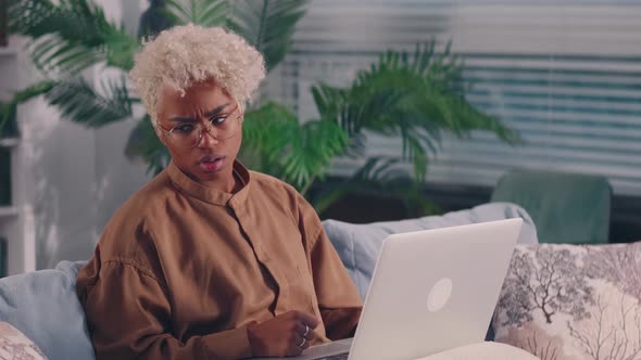 Upset African Woman Using Laptop Feel Frustrated Mad About Computer Problem