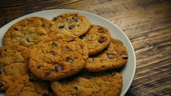 Passing Plate Of Cookies On Table