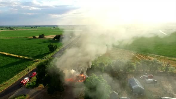 Aerial footage of house burning down