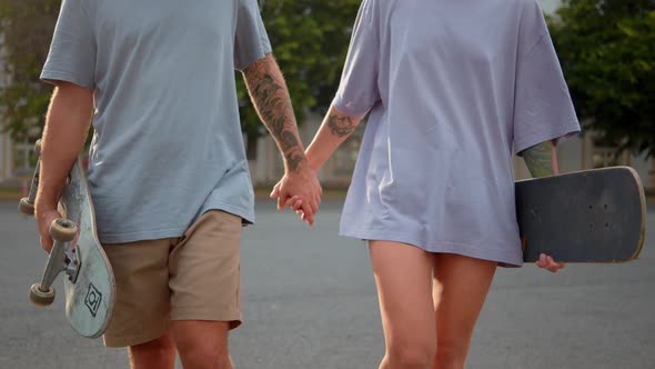 Active Couple Walking Tattoo Hand in Hand