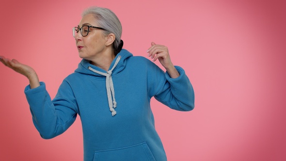 Ambitious Senior Woman Winner of Lottery Posing for Photographers Successful Famous Rich Person