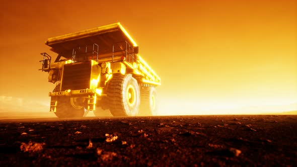 Big Yellow Mining Truck in the Dust at Career