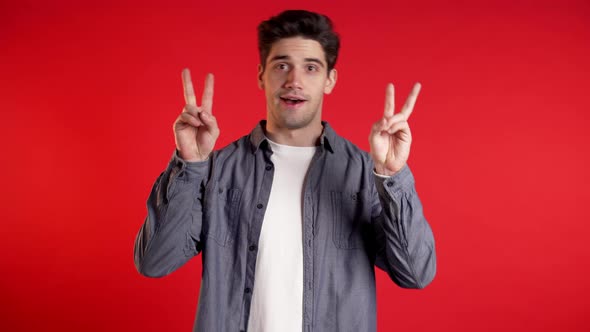 Handsome Man Showing with Hands and Two Fingers Like Quotes Gesture,bend Fingers