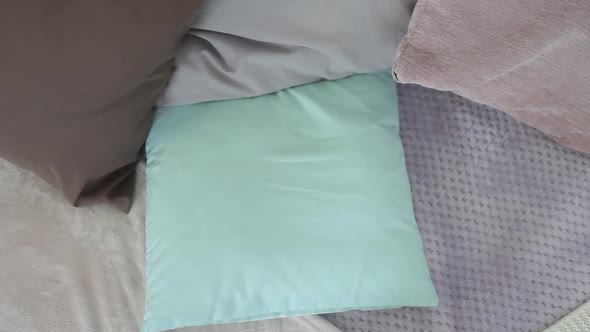 A Little Boy Lays Down on a Pillow in Bed and Gets Ready for a Dream