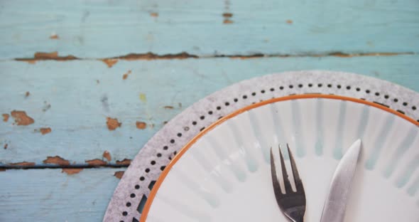 Various cutlery on wooden table 4k