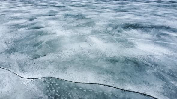 Flying above arctic ice floes, and icebergs.