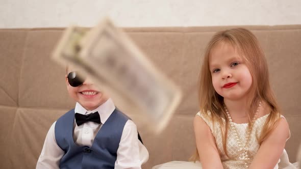 Money Falls in Front of Children