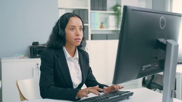 Latino beautiful business woman call center smile while work in office.