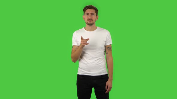 Confident Guy Is Scolding, Shaking His Index Finger. Green Screen