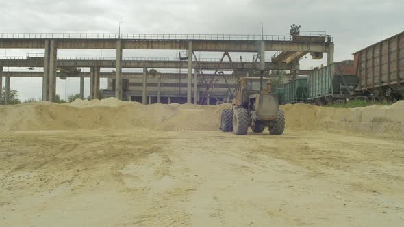 Tractor filling its loader