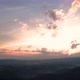 Aerial view of morning clouds at sunrise, over hills - VideoHive Item for Sale