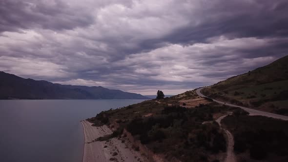 Scenic road by lake Hawea