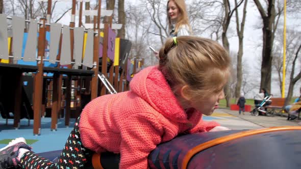 Junior Schoolgirl Plays Runs Holding Hands on Attraction