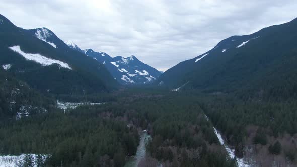 Aerial View of Chilliwack River with Snow During Winter Season