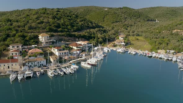 Aerial view of group of boats anchored on coast of mediterranean sea, Greece.