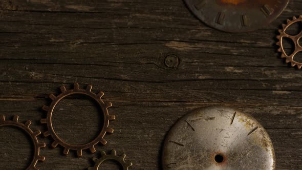 Rotating stock footage shot of antique and weathered watch faces 