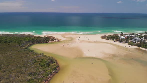 Aerial drone view of beach at Currimundi Lake, Caloundra, Sunshine Coast, Queensland, Australia