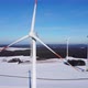 Orbiting a wind power plant with a drone. Circling a wind power plant in the air. - VideoHive Item for Sale
