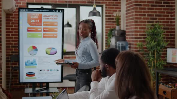 Close Up of African American Woman Presenting Marketing Strategy