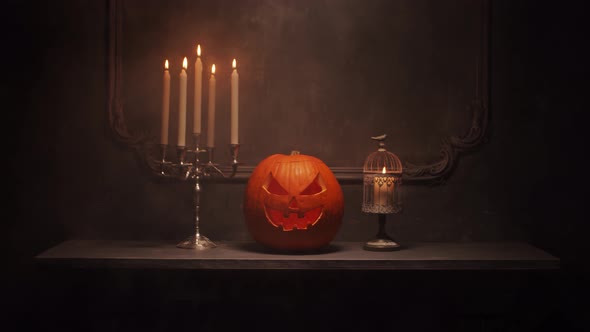 Scary laughing pumpkin and an old skull over the frightening gothic background.