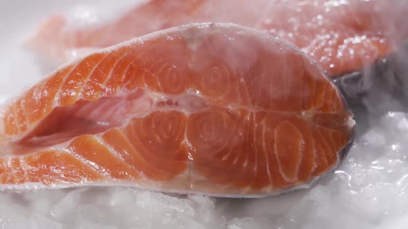 Closeup of Slice of Red Fish on Ice in the Fish Market