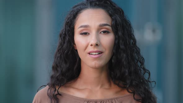 Closeup of Satisfied Happy Hispanic Female Young Face