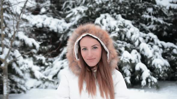 Beautiful Young Girl Winter Portrait on a Background