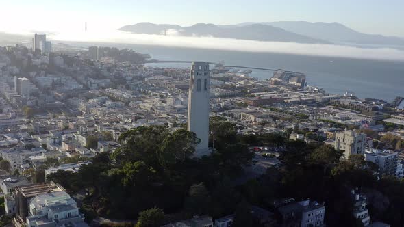 Aerial, San Francisco Coit Tower and cityscape, panning right drone 03.