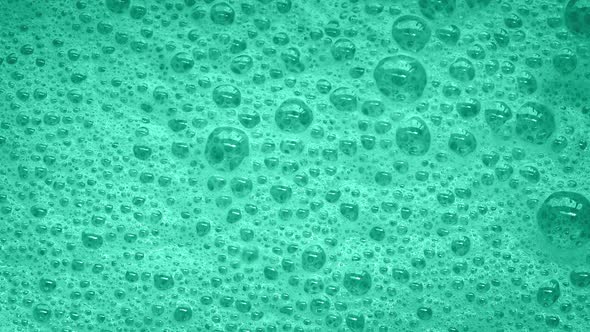 Light Green Foam With Bubbles Popping