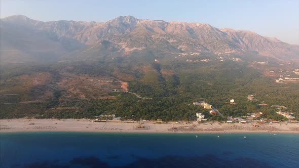 Beach shore with mountains in background