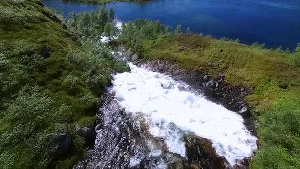 Above beautiful waterfall in Norway