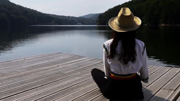 Romanian girl on the lake pontoon - Valiug, Romania 5