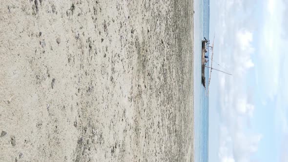 Vertical Video of Low Tide in the Ocean Near the Coast of Zanzibar Tanzania Aerial View