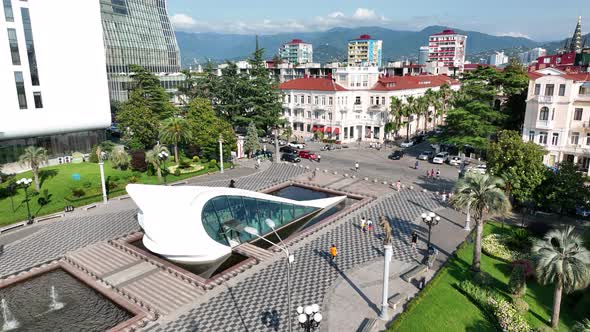 Aerial view of wedding palace and fountains near Technological university tower