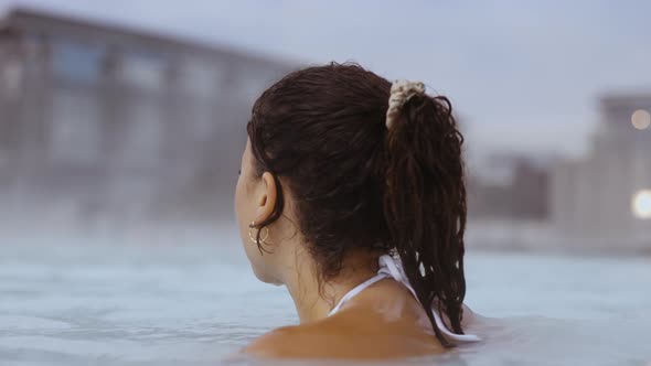 Woman Relaxing In Lagoon Geothermal Spa