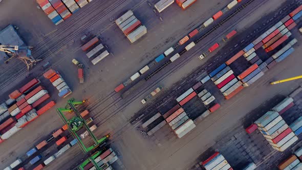 Aerial View From a Rotating Drone of the Trucks at the Terminal in the Queue for Unloading