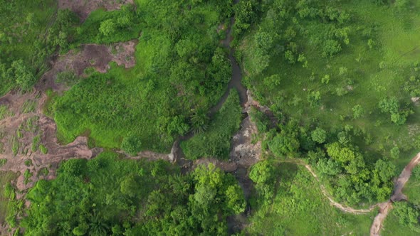 Aerial shot of a breathtaking landscape under the cloudy skies_2