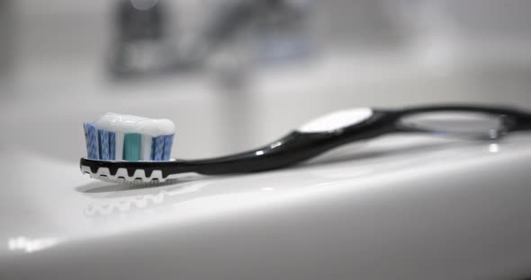 Close Up of Toothbrush with Paste