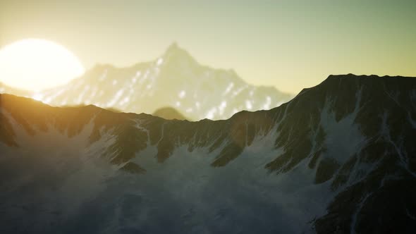 Winter Landscape in Mountains at Sunset