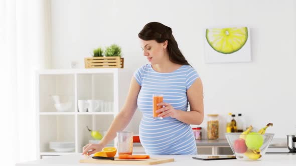 Pregnant Woman Drinking Fruit Smoothie at Home 8