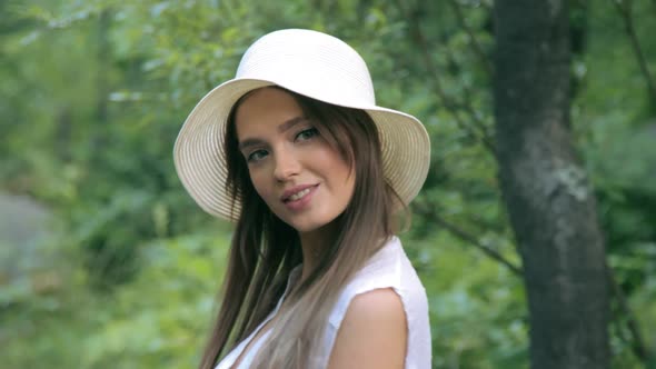 Beautiful girl posing in forest