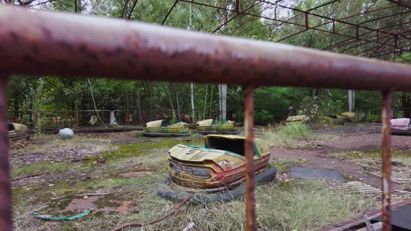 Abandoned Bumper Cars in the Amusement Park in Ghost Town of Pripyat