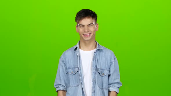 Guy Jokes, He Is Not Bored, He Is Happy and Positive. Green Screen