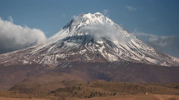 Snowy Volcanic High Altitude Mountain Cone